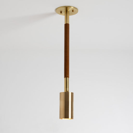 Natural Brass with Caramel Leather. 